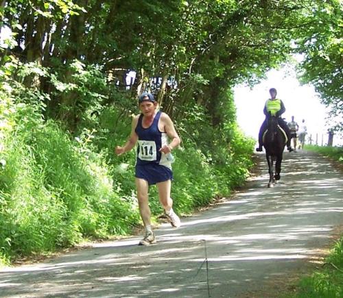 Competitors in the 2006 MAn versus Horses Marathon - Since 1980 in the town of Llanwrtyd Wells in Wales dispute a strange race called 'Man versus Horse Marathon'.