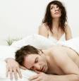 Snoring - Woman loosing sleep because her man is snoring
