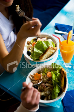 eating - Women eating healthy food.