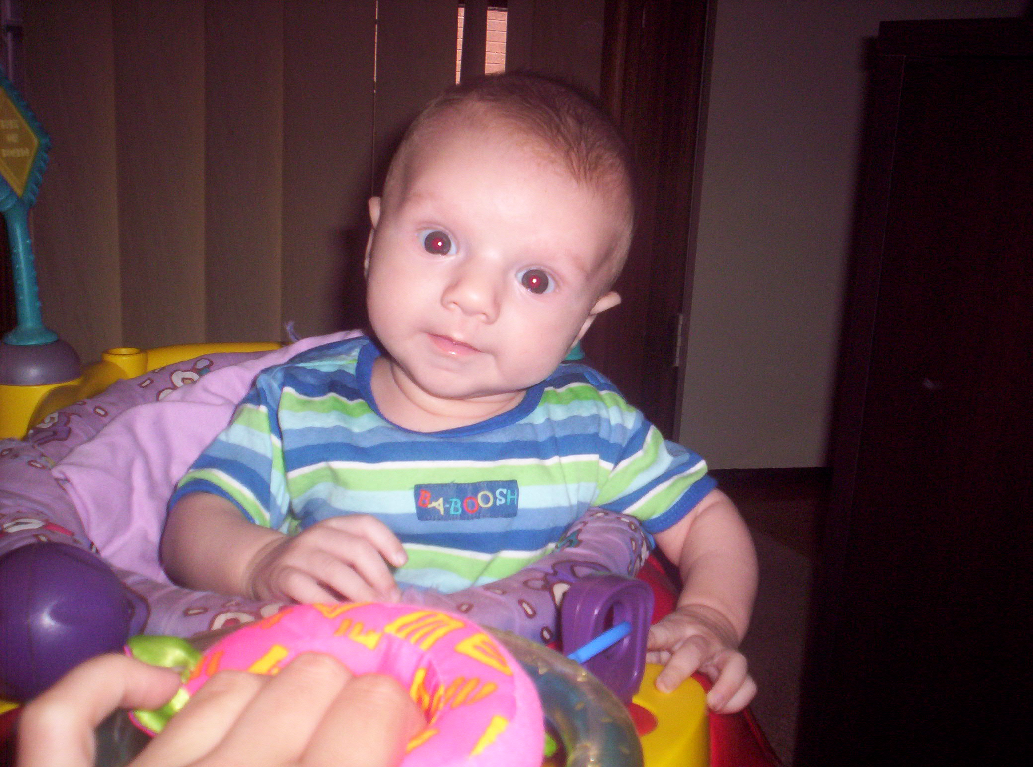 Kai Douglas - This is a pic of my beautiful baby boy Kai, chilling out in his car...lol, isnt he a spunk?