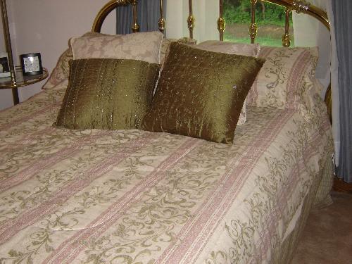 Bedroom - Bed with Pillows in Bedroom.