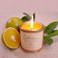 Scented candles - orange/citrus scented candle.