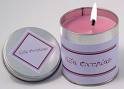 Scented candles - pretty pink scented candle with purple holder.