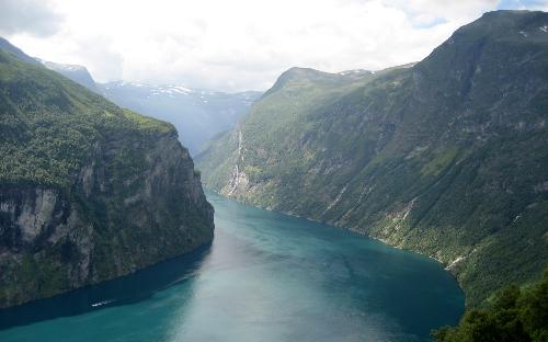 Lake between Mountains - Its a beautiful scenery of a Lake which is passing in between two mountains just like Nose in between two eyes.