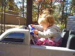 kirsten in bubba's truck - kirsten playing in bubba's truck kirsten in bubba's truck - kirsten playing in bubba's truck