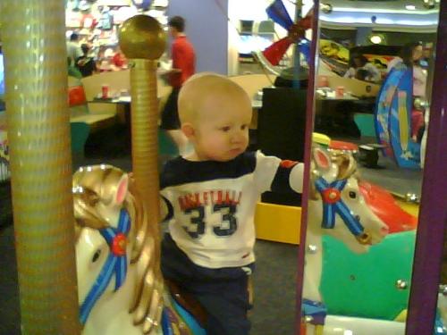 this was him at 16 months - If you look REALLY close, LOL, you can see his hair at the top of his head.