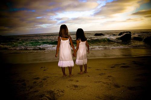 Sisters... - Two sisters on a beach (little girls)...