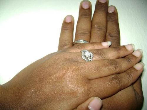 Rings of Love - Picture of my hubby's hand with his wedding band. My hand is on top of his with my engagement ring and wedding band. We got married in on June 6.