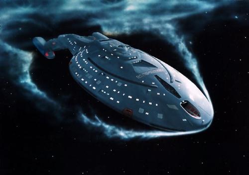 USS Voyager - A photo of the USS Voyager (Star Trek: Voyager), passing through spacial gases.