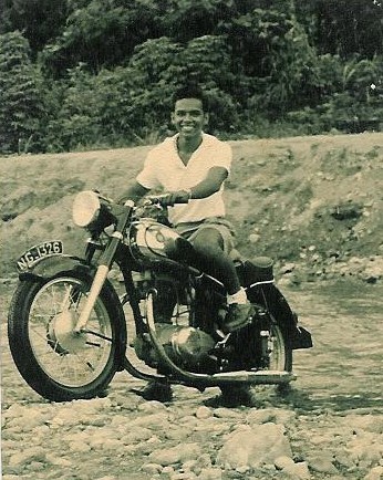 Dad in New Guinea - This might have been taken around 1958 or so. Dad and his motor cycle could not be separated. He always rode with his buds through the New Guinea jungles, rivers and on beaches. FUN!!!