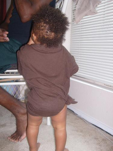 Wearing one of my shirts - We had just gotten home from the pool and she was wearing one of my shirts