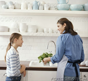 my mother - mother and daughter, mother watering basil plant.