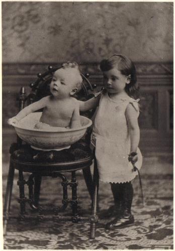 baby in a basin - This is a very old photograph of my grandfather as a baby.  Does anyone else collect old family photos of this nature?  It is in surprisingly good condition, too.