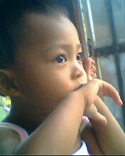 my baby girl - she's my first child though she looks like a boy shes my9 baby girl :)