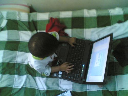 Thats my kid working on his fathers laptop - When we were small we dint even know how a computer looked and to see my two year old trying to do what we do at the computer....... The world is moving fast.