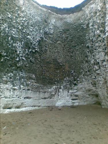 Chalk cliffs and caves - These chalk cliffs contain little caves, made throughout the years by the rough tides. They are great to explore and for playing hide and seek!