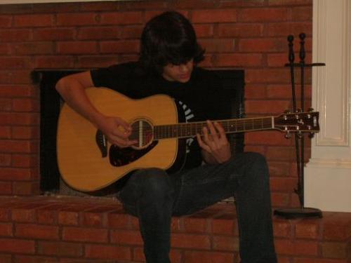 It's me - Well, this is me playing guitar