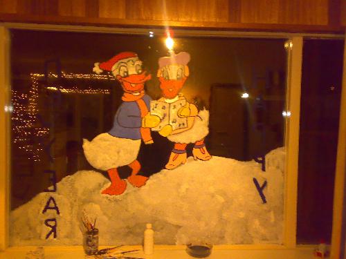 Donald and Daisy christmas window painting - First one I could track down that I have a pic of; my neice and I made this one.
Propertions aren&#039;t very good but we had a lot of fun making it!