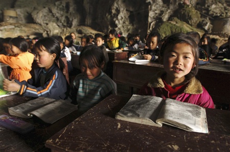 a school in a cave - this picture send a friend. this is a cave where the school build. its sound me very interesting. but i don't where the school is.