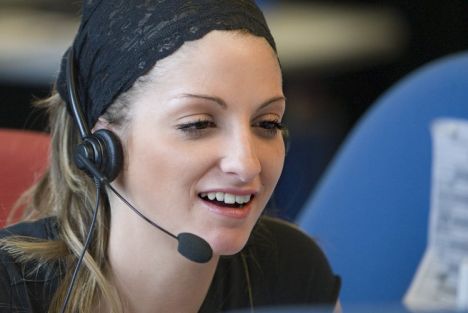 Speech to Text - This is an image of a user of a speech to text software. You only need a mic and the software. Use the mic to read the documents you will encode and the software will translate the speech into text. Your speech will automatically be typed in your MS word or whatever software you are using for typing documents.