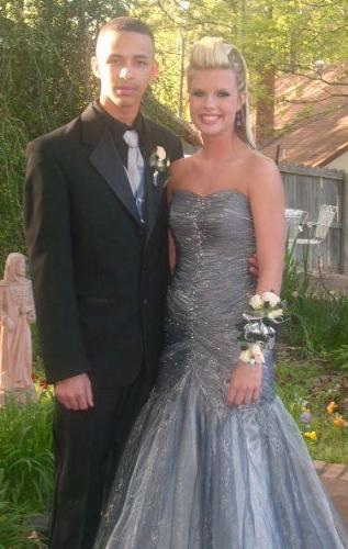 prom 2008 - My youngest son and his girlfriend at the 2008 high school prom. The last of 4 kids to graduate. I have accomplished that at least. He is in a black tux with silver accents. She is wearing a gorgeaous black and silver gown.