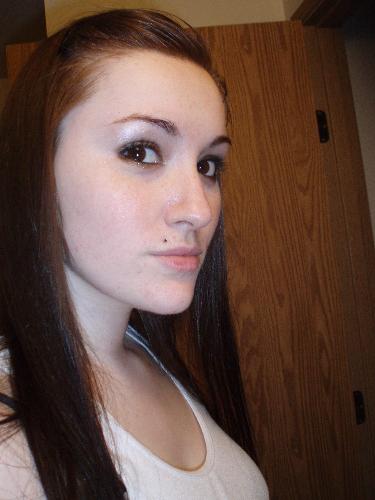 me - Its just me! I don't really know how descriptive I can be about the picture. I am turning 21 in august and I have brown eyes....I think that's really all I can say about it.