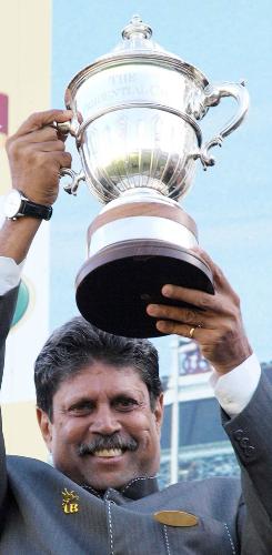 Kapil Dev - Kapil Dev holding the 1983 WC trophy