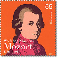 Mozart Stamp - A German stamp on the occasion of Mozart's 250th birthday. It is orange in colour with a portrait of the composer centered in the middle of the stamp.