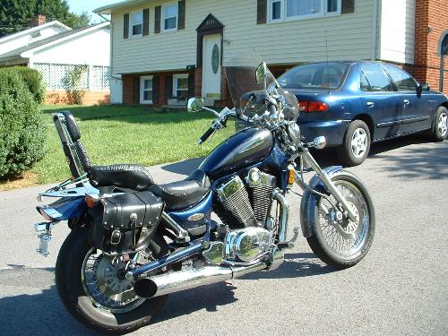 Suzuki Intruder 1400 - Recent purchase to combat the price of gas. Now I laugh all the way to the gas station.
