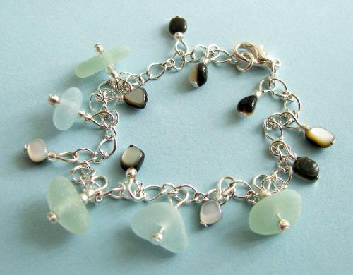 Sea Glass Bracelet - Soon to be offered in my Etsy shop. This bracelet is made with soft-blue sea glass and polished shells. Very summery and elegant.