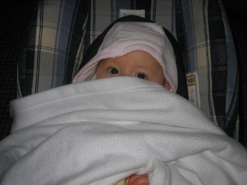 My little girl when she was a baby. - This was taken when she was a lot littler. It's hard now to believe that she ever used to be shy! Or that she'd ever hide from a camera. This would never happen now:o)