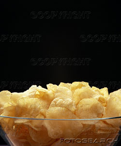 potato chips - potato chips in glass bowl