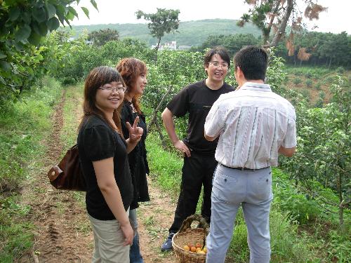 my friends and I - a summer day,we had gone to an apricot orchards.what a happy day!Look,our havest in the basket.