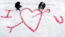 In love - I love you. Writtem in the sand. Being in lobe.