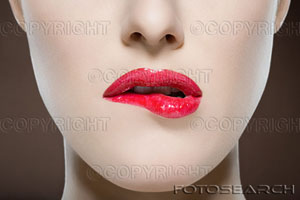 lip gloss - woman biting her lip