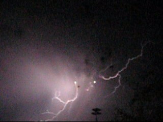 Lightning in night sky - A bolt of lightning in the night sky.
