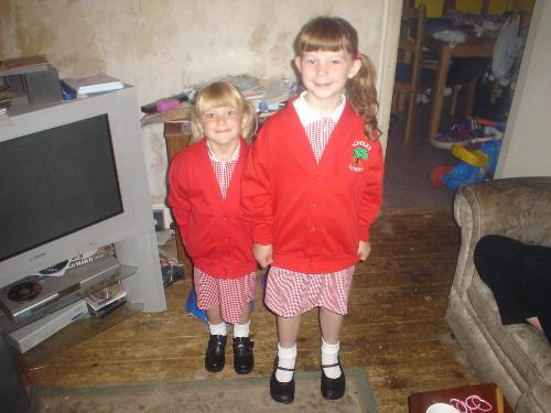 my two ready for school - we buy school uniform in the first week of september or late august as our two grow lol. Here they are ready for school