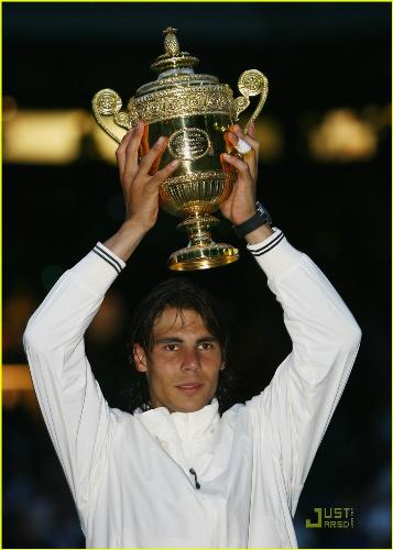 Rafael Nadal - Rafa holding his huge Wimby trophy after beating Roger Federer in the 2008 Wimbledon Championship