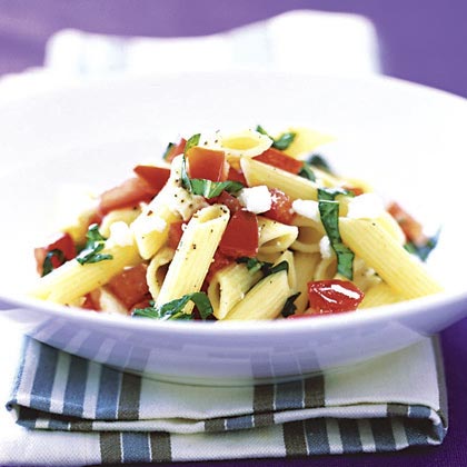 Pasta with Basil, Tomatoes, and Feta - Combine a no-cook sauce of fresh chopped tomato, olive oil, and feta cheese with hot cooked penne, and toss.