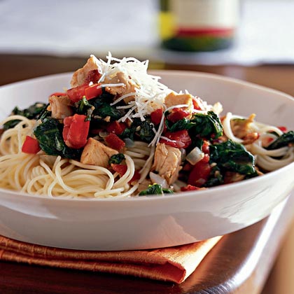 Angel Hair Pasta Delight - Sweet onions, fresh spinach, and plum tomatoes lend bright color and fresh flavor to the delicate pasta dish.