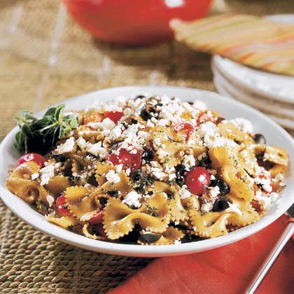Bow Tie Pasta Toss - Keep it simple and stir grape tomatoes, olives, and onion into cooked pasta, then toss with a balsamic vinaigrette.