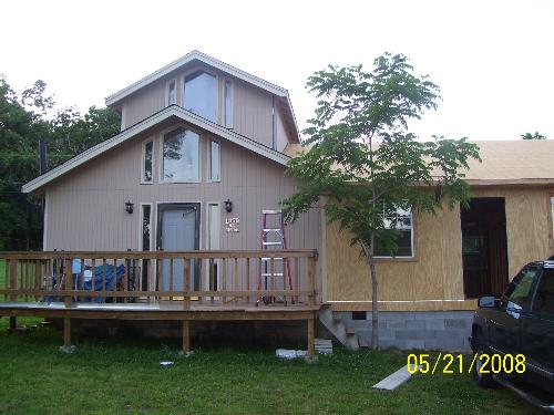 Our house being added onto - This is our house and the addition. We are doing everything ourselves to save on labor....