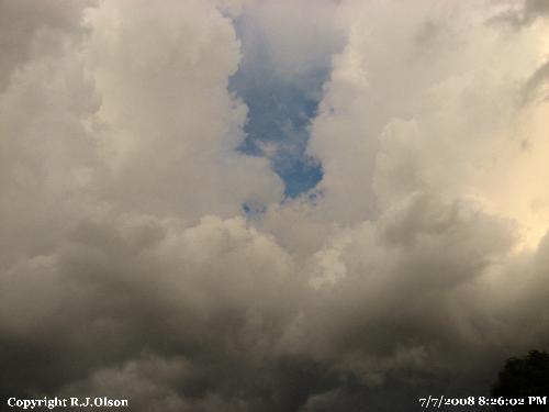 Pre-Storm - A cloud formation moments before hail & high winds hit. Pre-Storm - A cloud formation moments before hail & high winds hit.