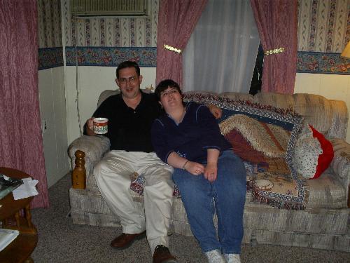 Amanda & Mark - This is a picture of Mark and I on my couch. He loooooooves to drink coffee!!!!!