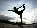 yoga on beach - yoga on beach holding a pose