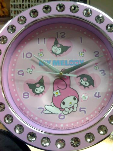 my room clock - it's of the sanrio character kuromi. the darker twin of my melody. really love the character to bits.