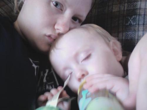 Cooper and Aarika - Coop snuggling his mommy napping. Cooper and Aarika - Coop snuggling his mommy napping.