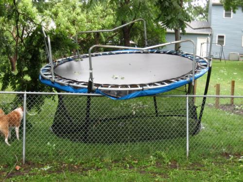 Trampoline - Trown over the fence from possibly 70 MPH winds