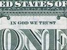 The Back of the amican dollar - A picture of the American dollar cropping the words 'In God we trust.'