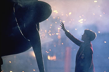 Christian Bale - Christian Bale from empire of the Sun reaches to touch Japan fighter plane nose